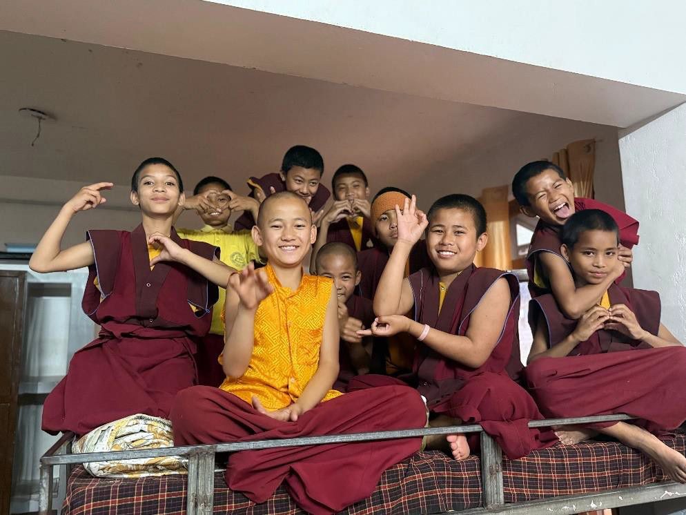 Children sharing a playful moment between classes