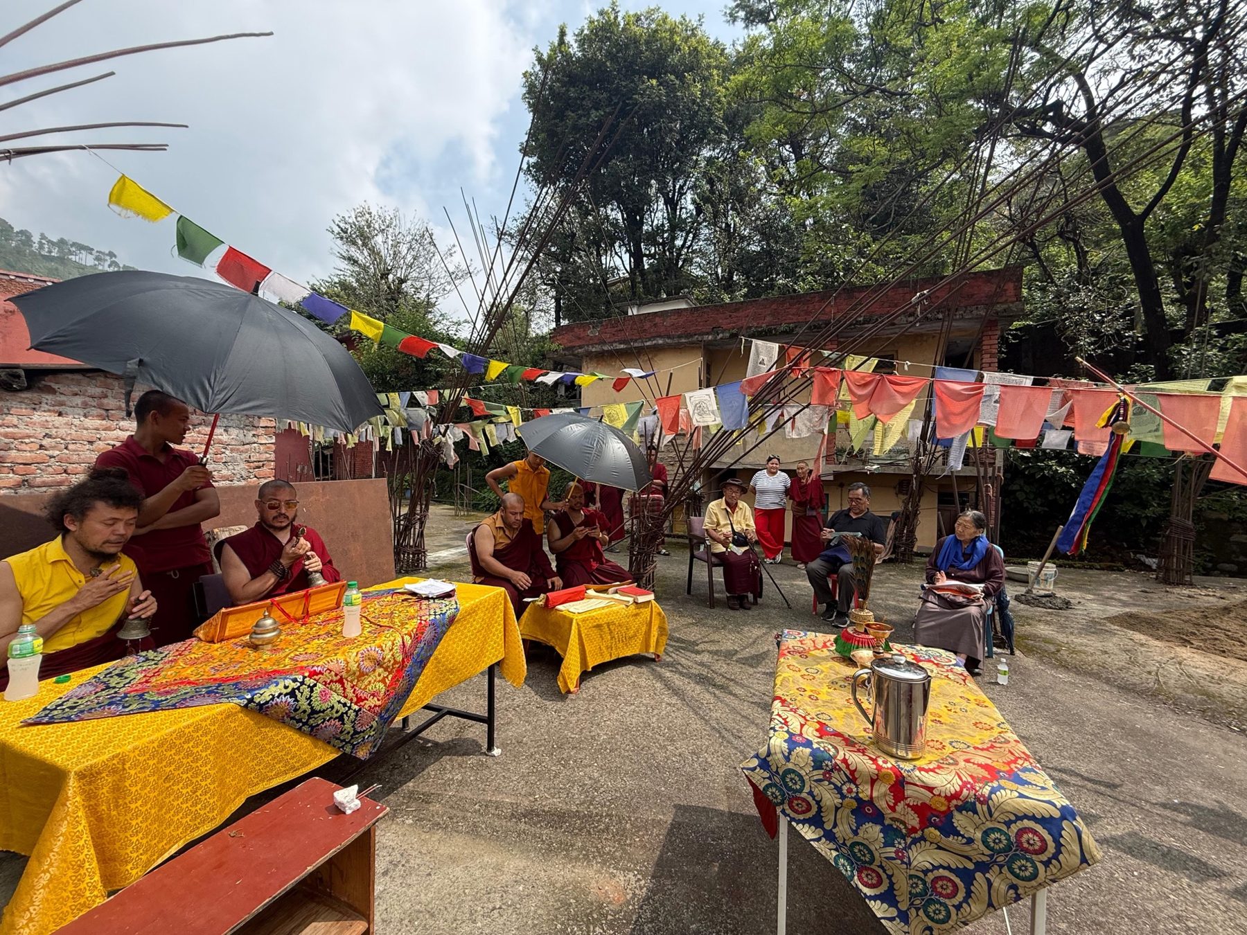 Monks and community members gathered for the project blessing puja