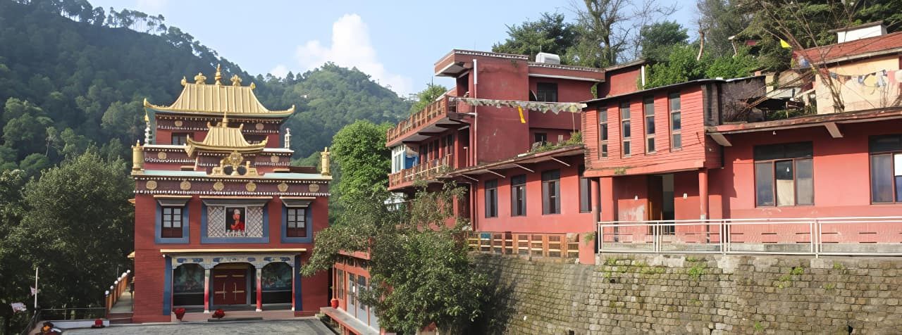 The monastery complex at Tso Pema, with the temple and adjoining buildings on the hillside
